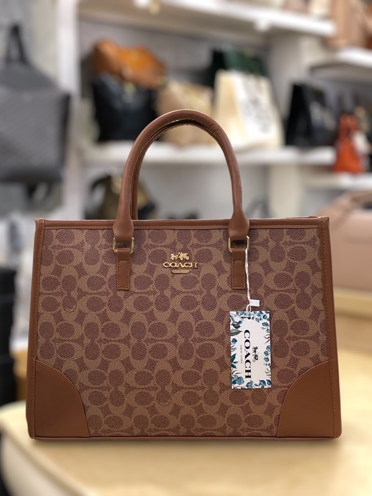 Coach Signature Print Tote Bag for Women with Double Top Handles and Spacious Everyday Carry Design - Beige Rs 3,123